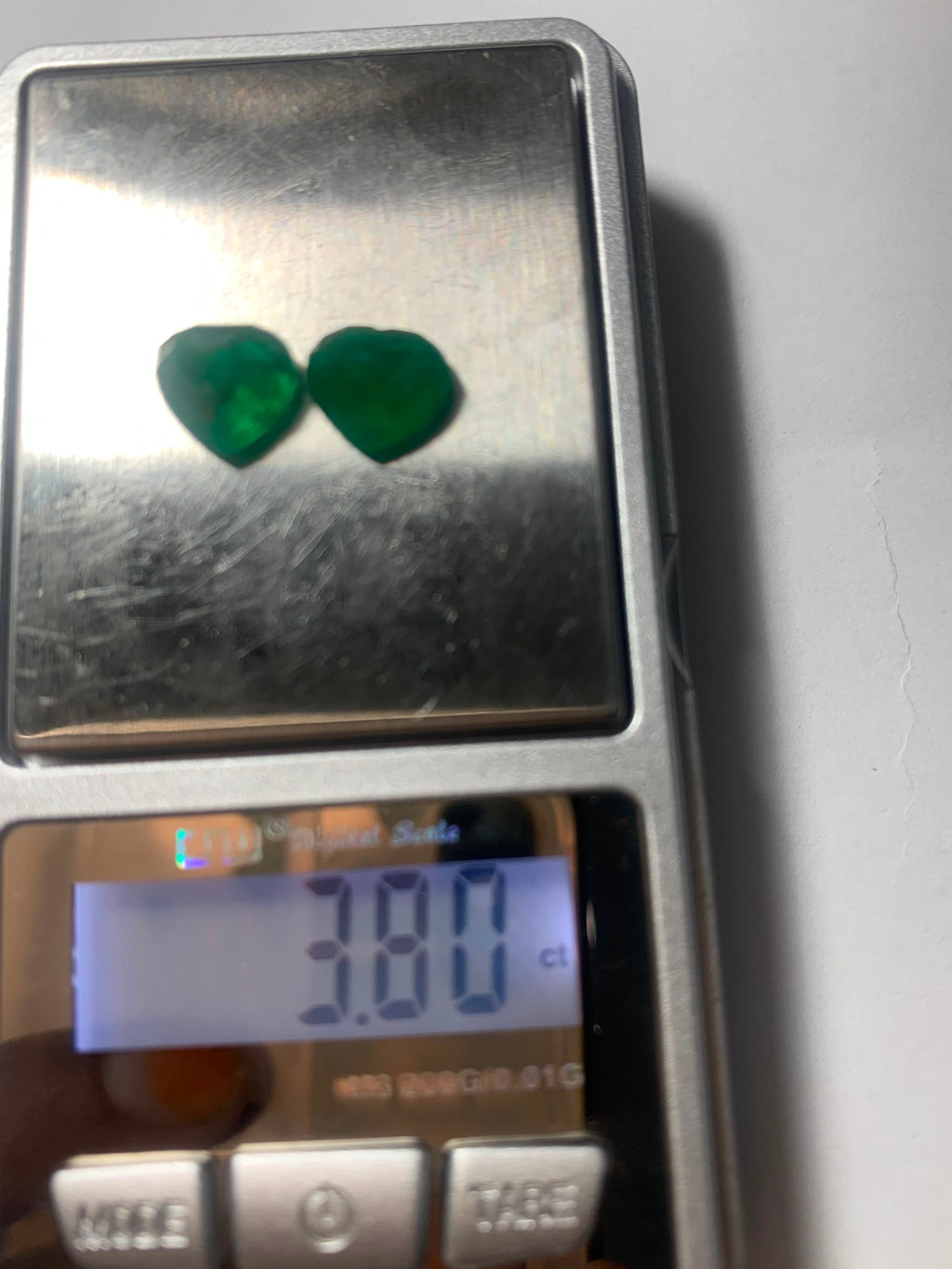 Green Emerald and Red Ruby Faceted cut pairs in Heart Shape
