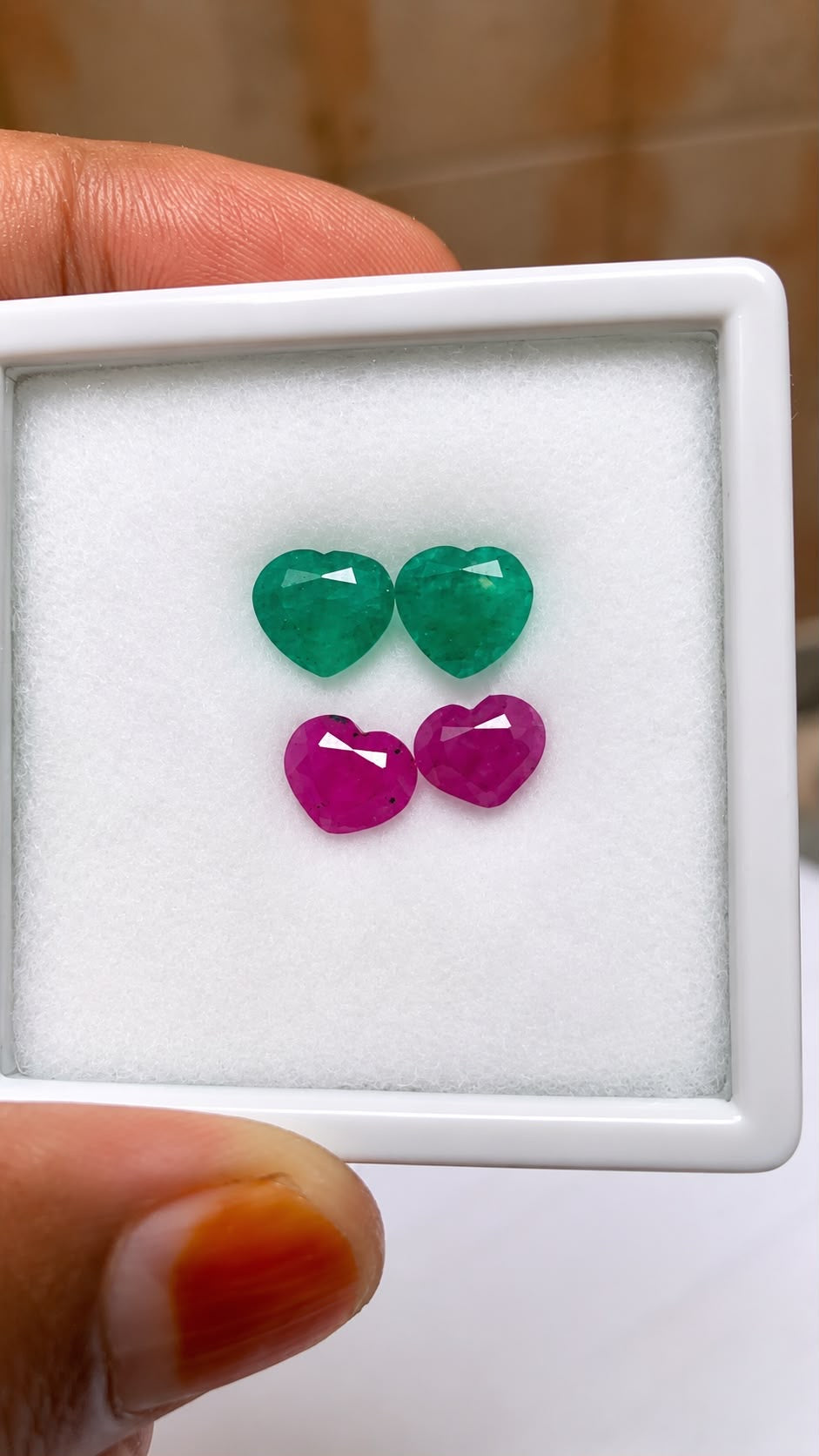 Green Emerald and Red Ruby Faceted cut pairs in Heart Shape