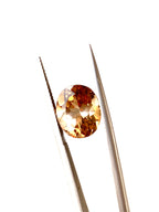 Oval cut brown topaz

