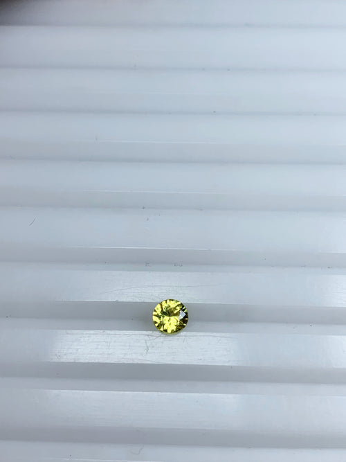 Yellow sapphire 0.50ct round cut certified
