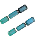 Set of blue gemstones in a display case