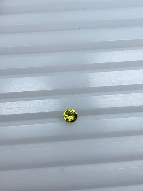 Pukhraj yellow sapphire 0.50 carat round cut
