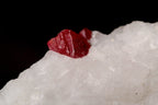 Untreated red spinel on natural matrix
