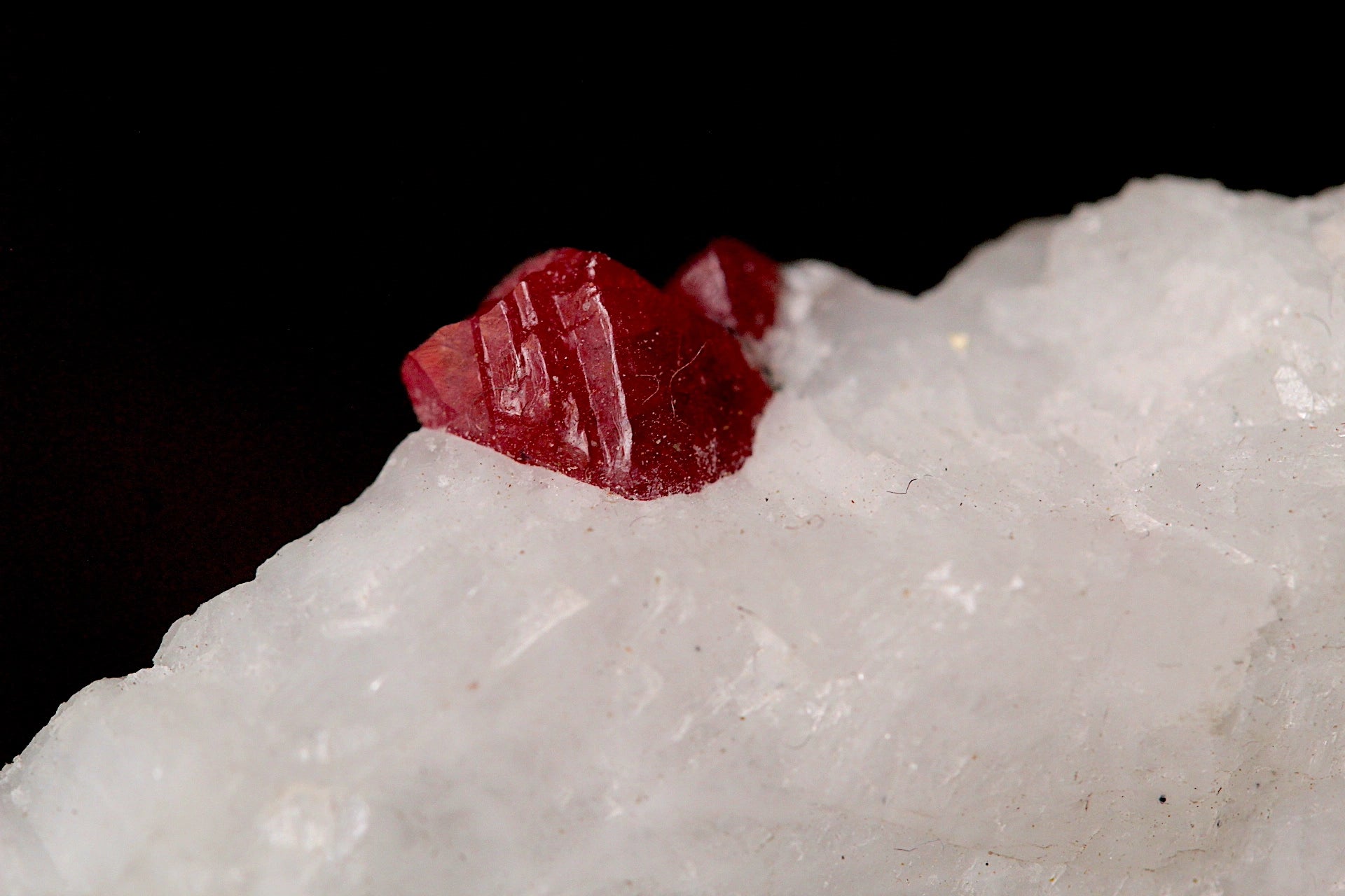 Untreated red spinel on natural matrix