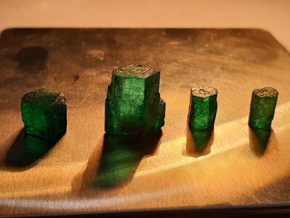 three stone emerald cut ring