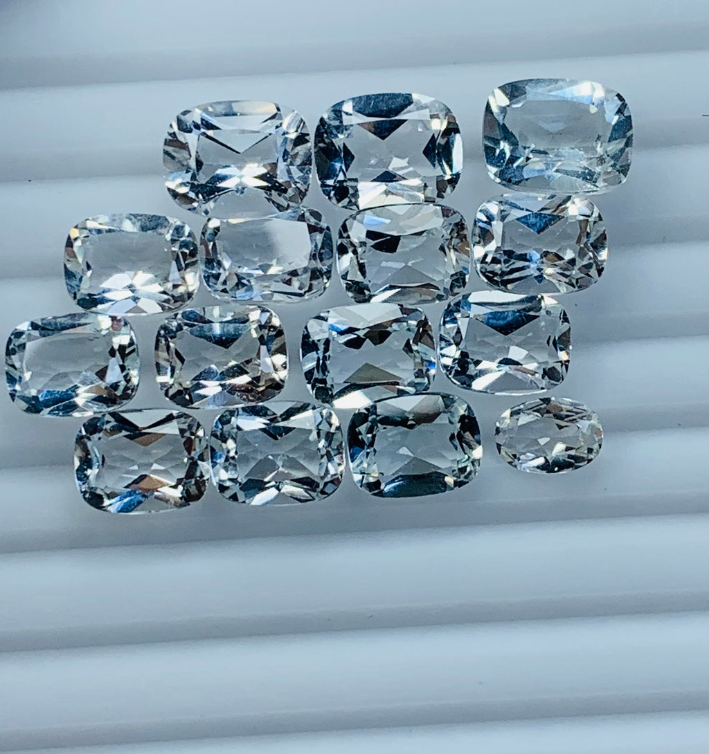 white tapaz faceted gemstone
