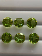 peridot huggie earrings