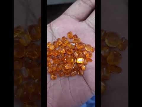 20 carats clinohomite and 4 carats peridot stone