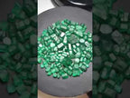 green gemstone emerald raw stone 