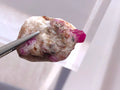 ruby inclusions visible on calcite matrix

