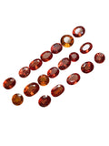 faceted orangish red sapphire 